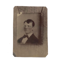 Curious Hand-tinted Tintype of Photograph of Young Man Pinned to Wall