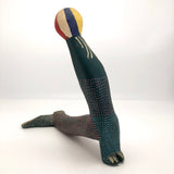 Fabulous Carved and Painted Wooden Sculpture of Seal or Sea Lion Balancing Ball