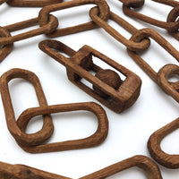 Eight Carved Whimsy Chains Plus Ball in Cage