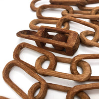 Eight Carved Whimsy Chains Plus Ball in Cage