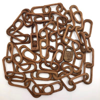 Eight Carved Whimsy Chains Plus Ball in Cage