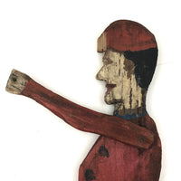Empathetic One Armed Wooden Man in Red Cap