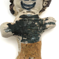 Smiling Bright Eyed Pottery Kid