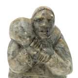 Inuit Soapstone Carving Of Man Carrying Seal, Signed