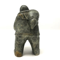 Inuit Soapstone Carving Of Man Carrying Seal, Signed