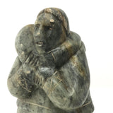Inuit Soapstone Carving Of Man Carrying Seal, Signed