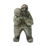 Inuit Soapstone Carving Of Man Carrying Seal, Signed