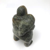 Inuit Soapstone Carving Of Man Carrying Seal, Signed