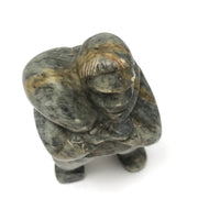 Inuit Soapstone Carving Of Man Carrying Seal, Signed