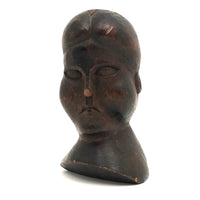 Antique Hand-Carved Frowning Woman