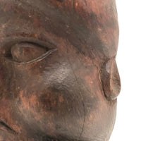 Antique Hand-Carved Frowning Woman