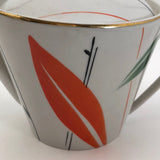 Jaunty Art Deco Porcelain Tea Pot with Orange and Black Design on White