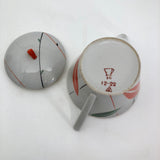 Jaunty Art Deco Porcelain Tea Pot with Orange and Black Design on White