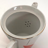 Jaunty Art Deco Porcelain Tea Pot with Orange and Black Design on White