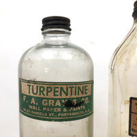 Pair of Early 20th C. Glass Turpentine Bottles with Great Labels