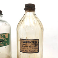 Pair of Early 20th C. Glass Turpentine Bottles with Great Labels