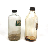Pair of Early 20th C. Glass Turpentine Bottles with Great Labels