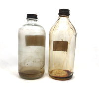 Pair of Early 20th C. Glass Turpentine Bottles with Great Labels