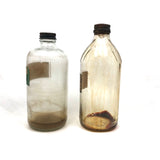 Pair of Early 20th C. Glass Turpentine Bottles with Great Labels