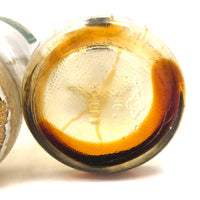 Pair of Early 20th C. Glass Turpentine Bottles with Great Labels