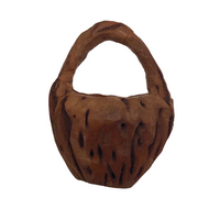 Tiny Peach Pit Carved Basket