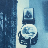 Woman in Parlor Behind Beaded Curtain, 1909 British Cyanotype