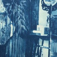 Woman in Parlor Behind Beaded Curtain, 1909 British Cyanotype