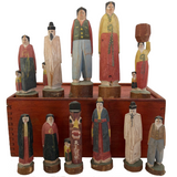 Exquisite Set of Eleven Hand-carved and Stained Multicultural Figures