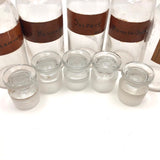 Glass Apothecary Bottles with Handwritten Labels from Houle's Pharmacy, Lowell, MA