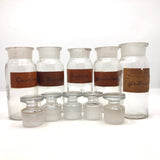 Glass Apothecary Bottles with Handwritten Labels from Houle's Pharmacy, Lowell, MA