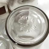 Glass Apothecary Bottles with Handwritten Labels from Houle's Pharmacy, Lowell, MA