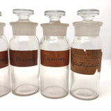 Glass Apothecary Bottles with Handwritten Labels from Houle's Pharmacy, Lowell, MA
