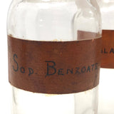 Glass Apothecary Bottles with Handwritten Labels from Houle's Pharmacy, Lowell, MA