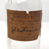Glass Apothecary Bottles with Handwritten Labels from Houle's Pharmacy, Lowell, MA