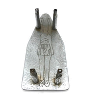 Wonderful Trench Art Iron Rest with Diving (?) Woman on the Underside