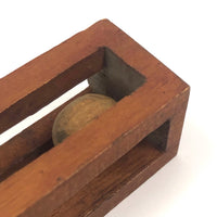 Geometric Carved Ball in Cage Whimsy