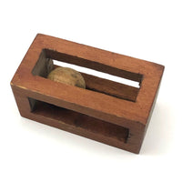 Geometric Carved Ball in Cage Whimsy