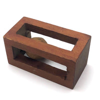 Geometric Carved Ball in Cage Whimsy