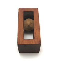 Geometric Carved Ball in Cage Whimsy
