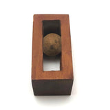 Geometric Carved Ball in Cage Whimsy