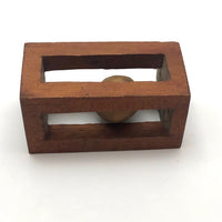 Geometric Carved Ball in Cage Whimsy