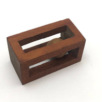 Geometric Carved Ball in Cage Whimsy