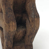 Old Carved Seated Figure on Stump