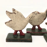 Three Old German Painted Wooden Geese on Green Bases