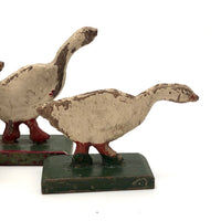Three Old German Painted Wooden Geese on Green Bases