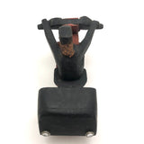 Hard-carved Man in Black with Mullet on (Three-wheeled) Motorcycle