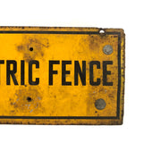 Battered Old Electric Fence Sign Mounted to Wood Block