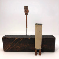 Hand-Carved Wooden Man with Hidden Tools!