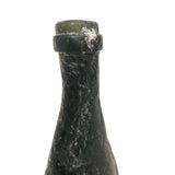Fire Transformed Old Glass Bottle with Amazing Surface