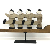 Figures Marching Down an Arrow, Old Wooden Folk Art Sculpture on Stand